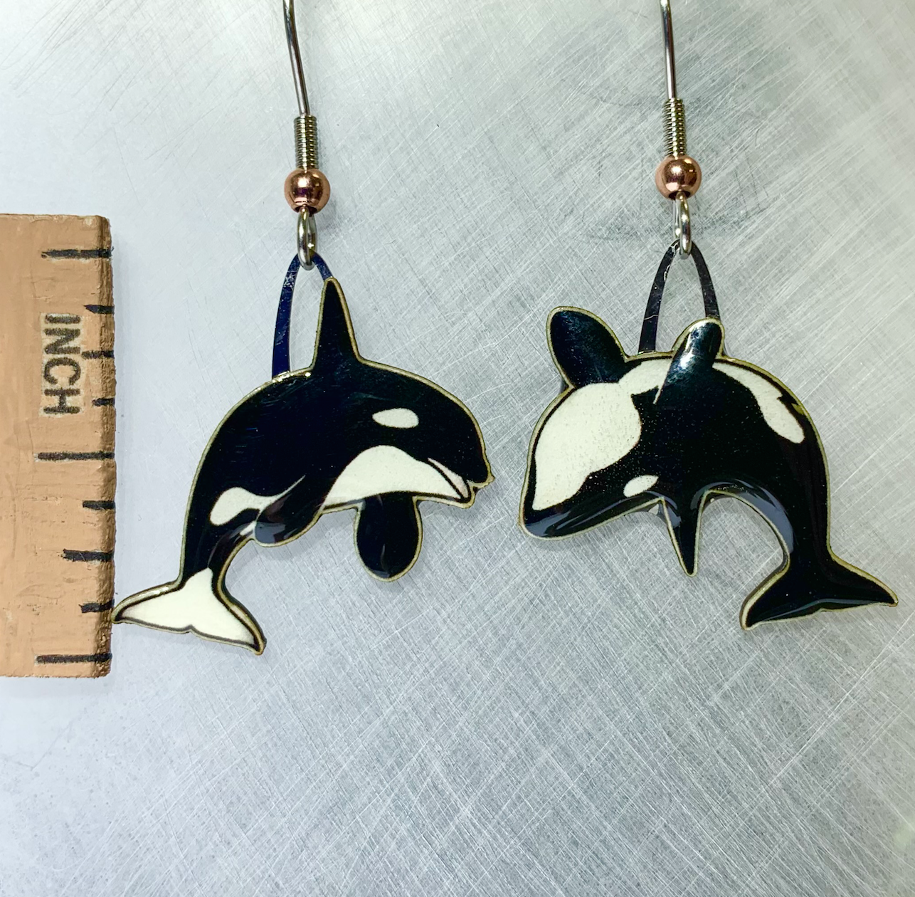 Picture shown is of 1 inch tall pair of earrings of the marine animal the Orca.