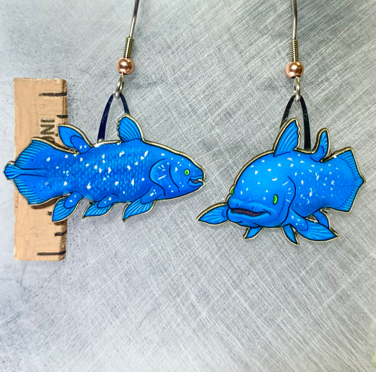 Picture shown is of 1 inch tall pair of earrings of the fish the Coelacanth.