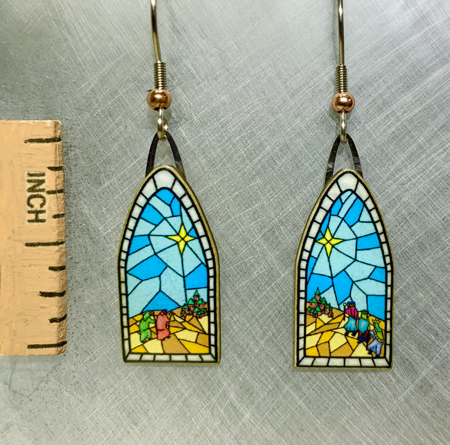 Picture shown is of 1 inch tall pair of earrings of Christmas Windows.