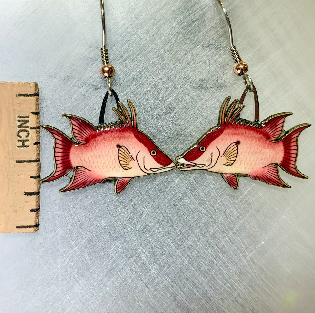 Picture shown is of 1 inch tall pair of earrings of the fish the Hogfish.