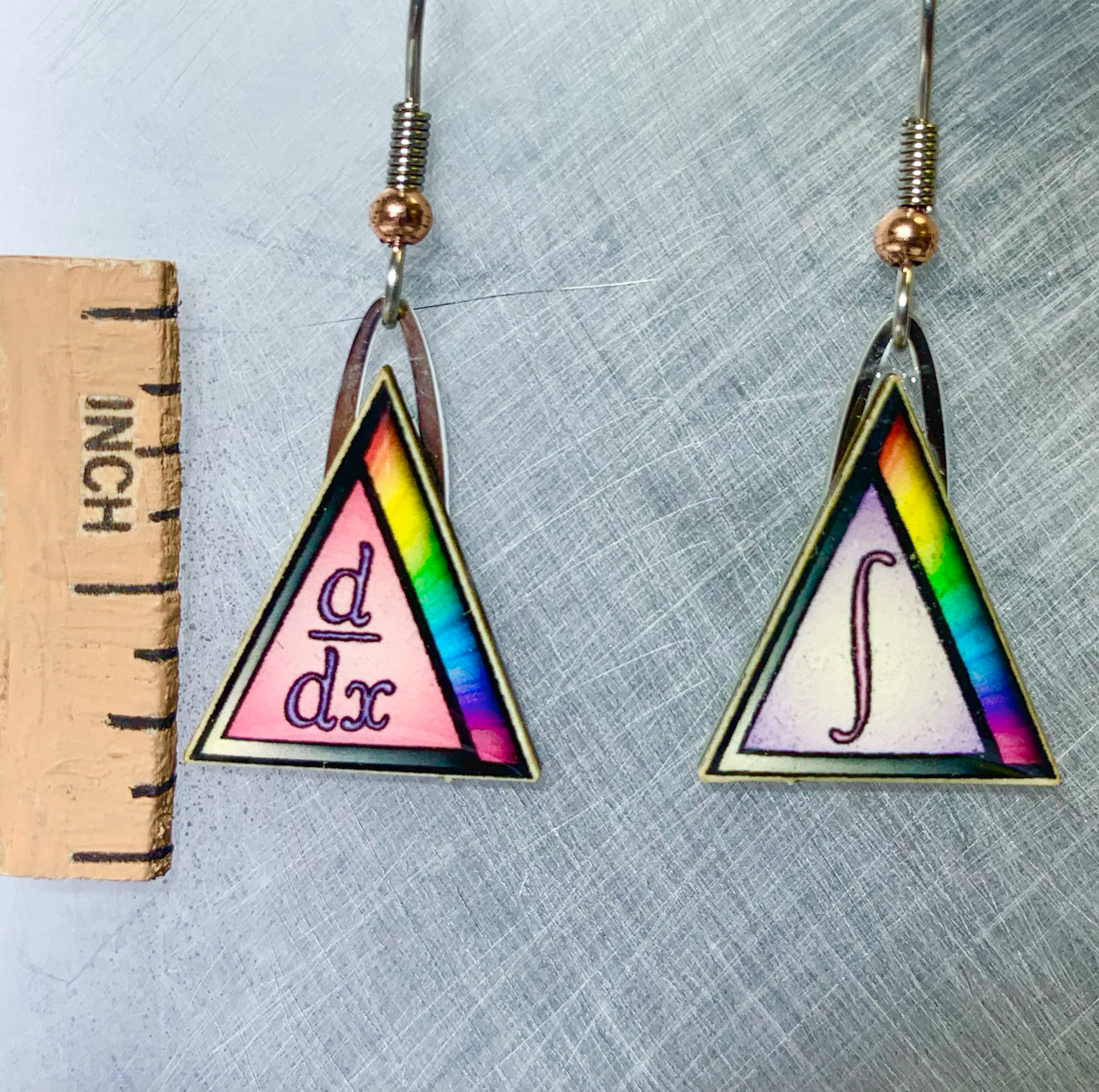 Picture shown is of 1 inch tall pair of earrings of Calculus.
