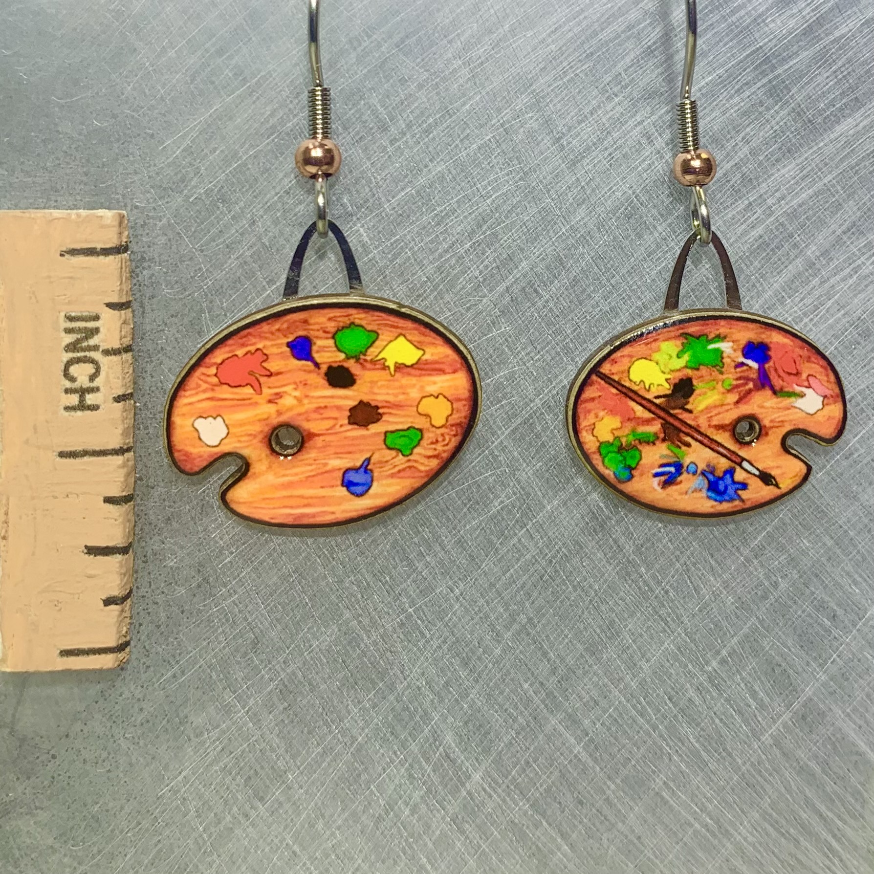 Picture shown is of 1 inch tall pair of earrings of an Art Palette.