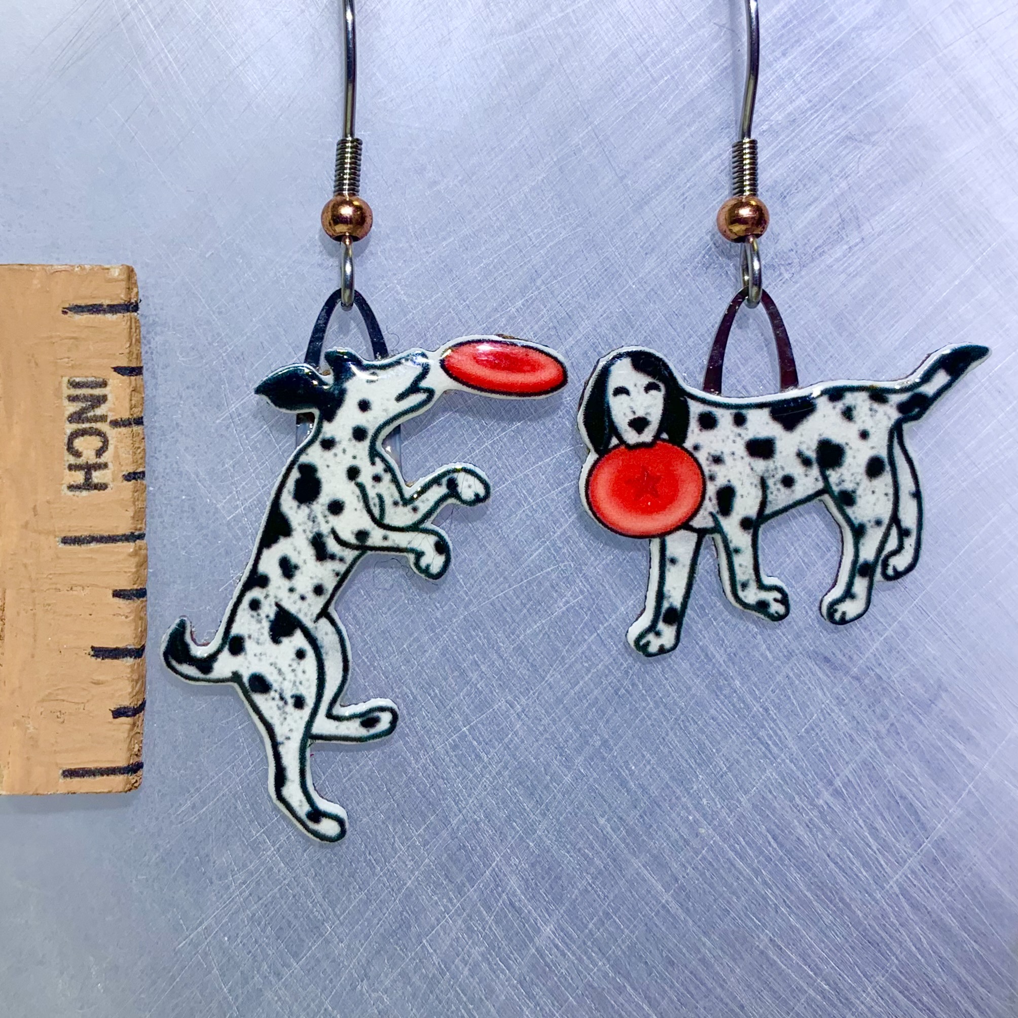 Picture shown is of 1 inch tall pair of earrings of the pet the Dog & Frisbee.