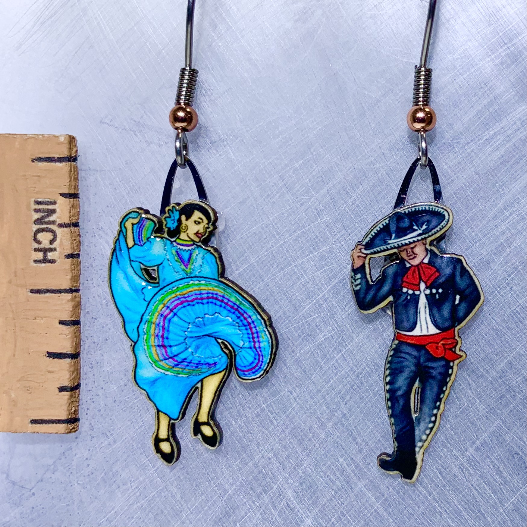Picture shown is of 1 inch tall pair of earrings of Turquoise Folklorico.