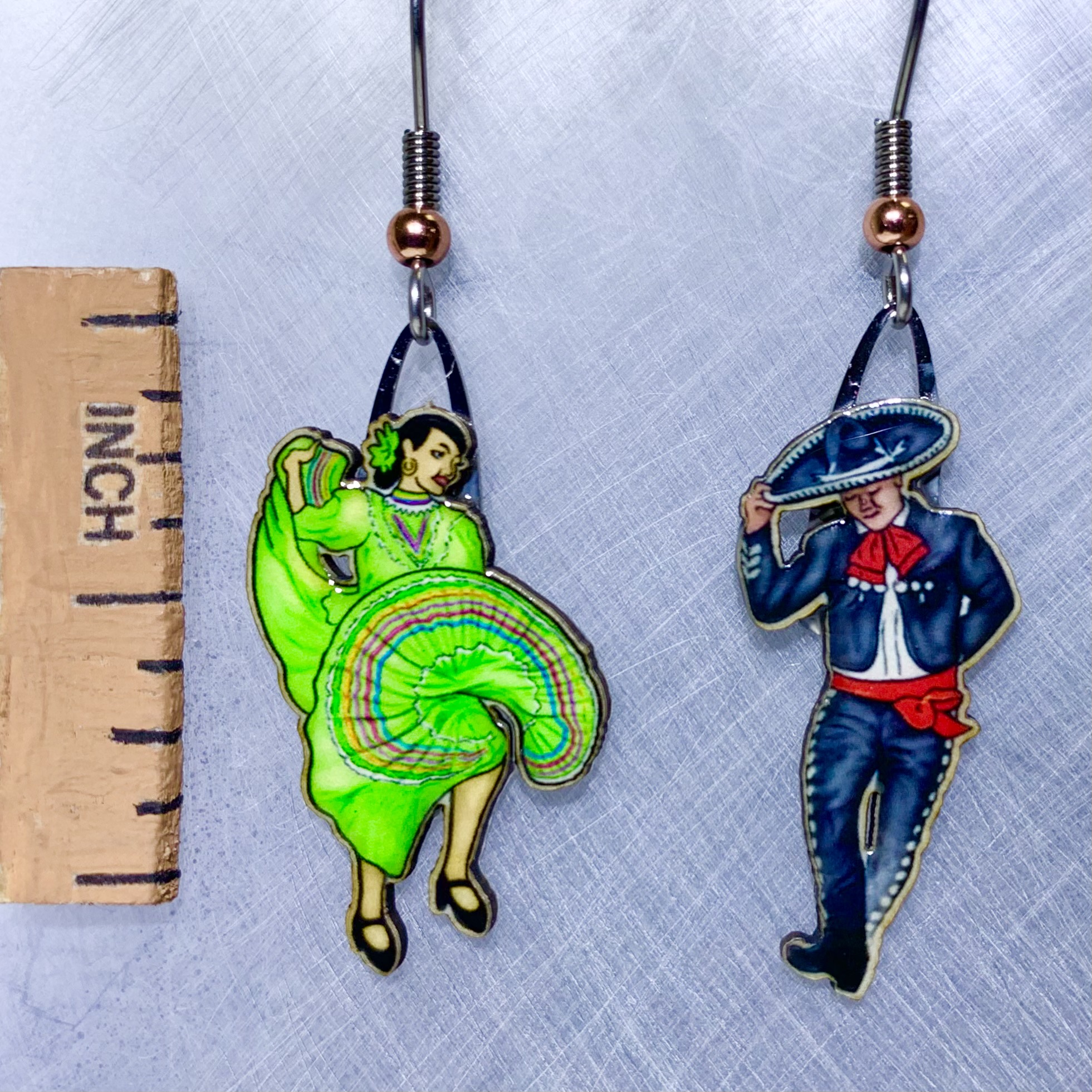 Picture shown is of 1 inch tall pair of earrings of Green Folklorico.