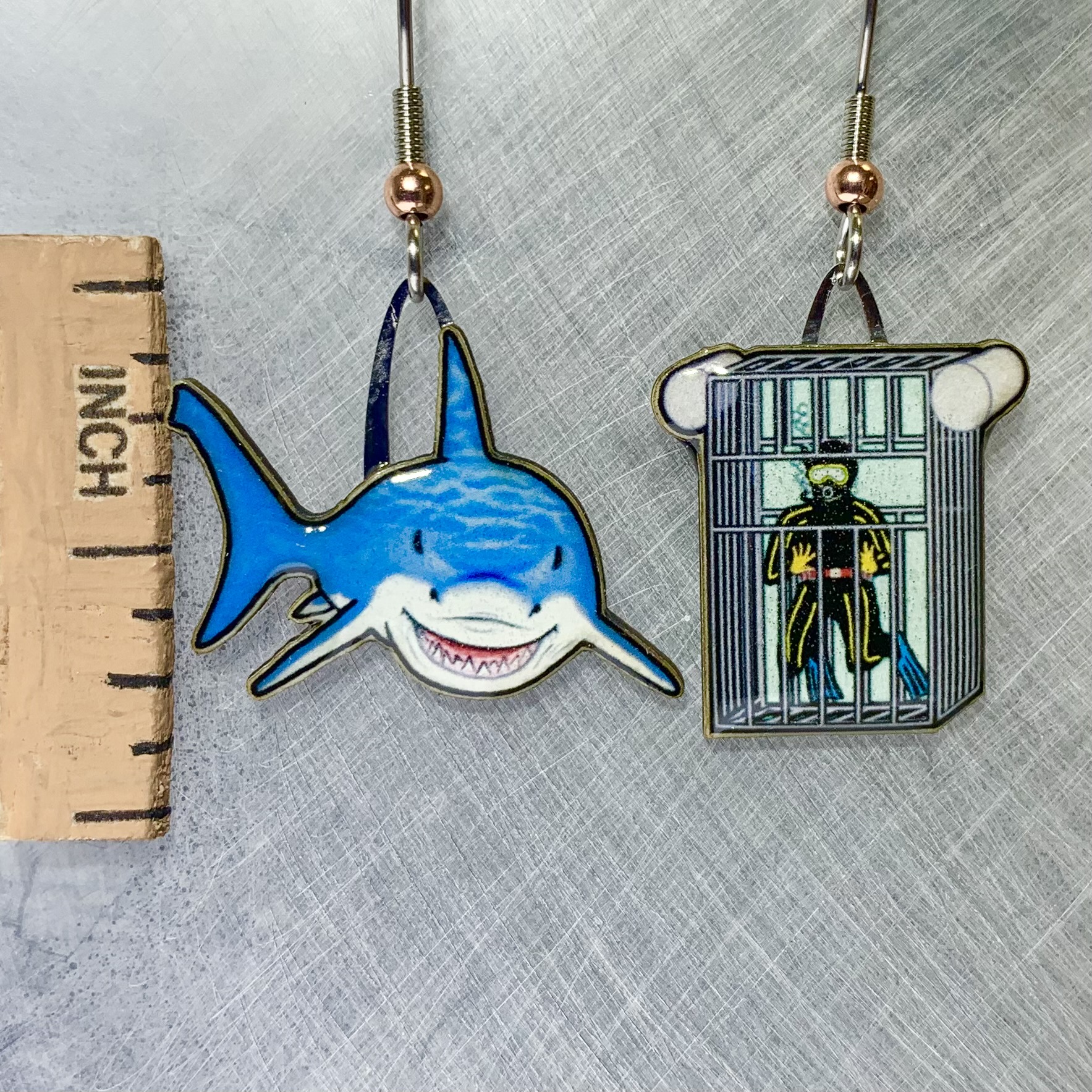 Picture shown is of 1 inch tall pair of earrings of the marine animal the Great White Shark.
