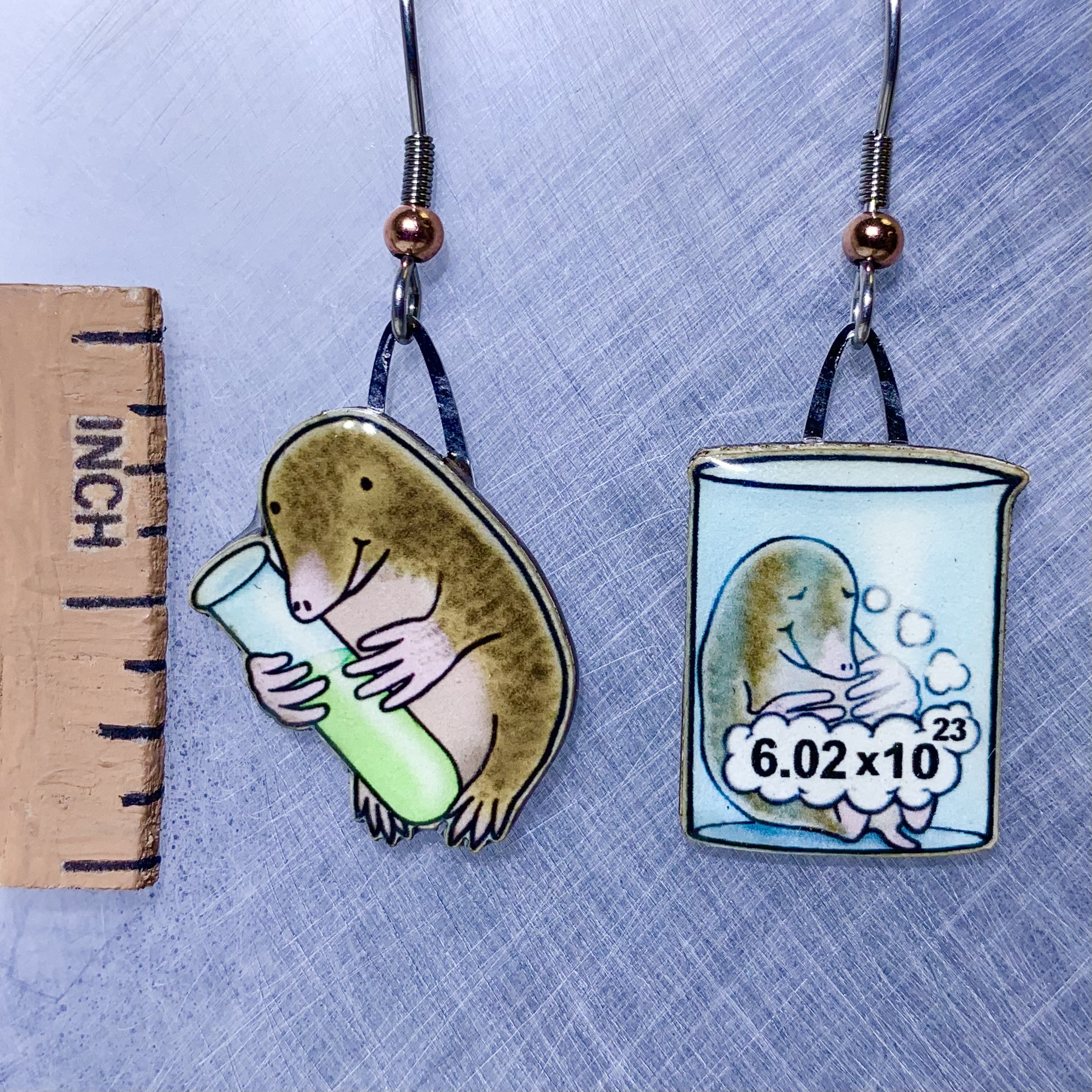 Picture shown is of 1 inch tall pair of earrings of Chemistry Mole.