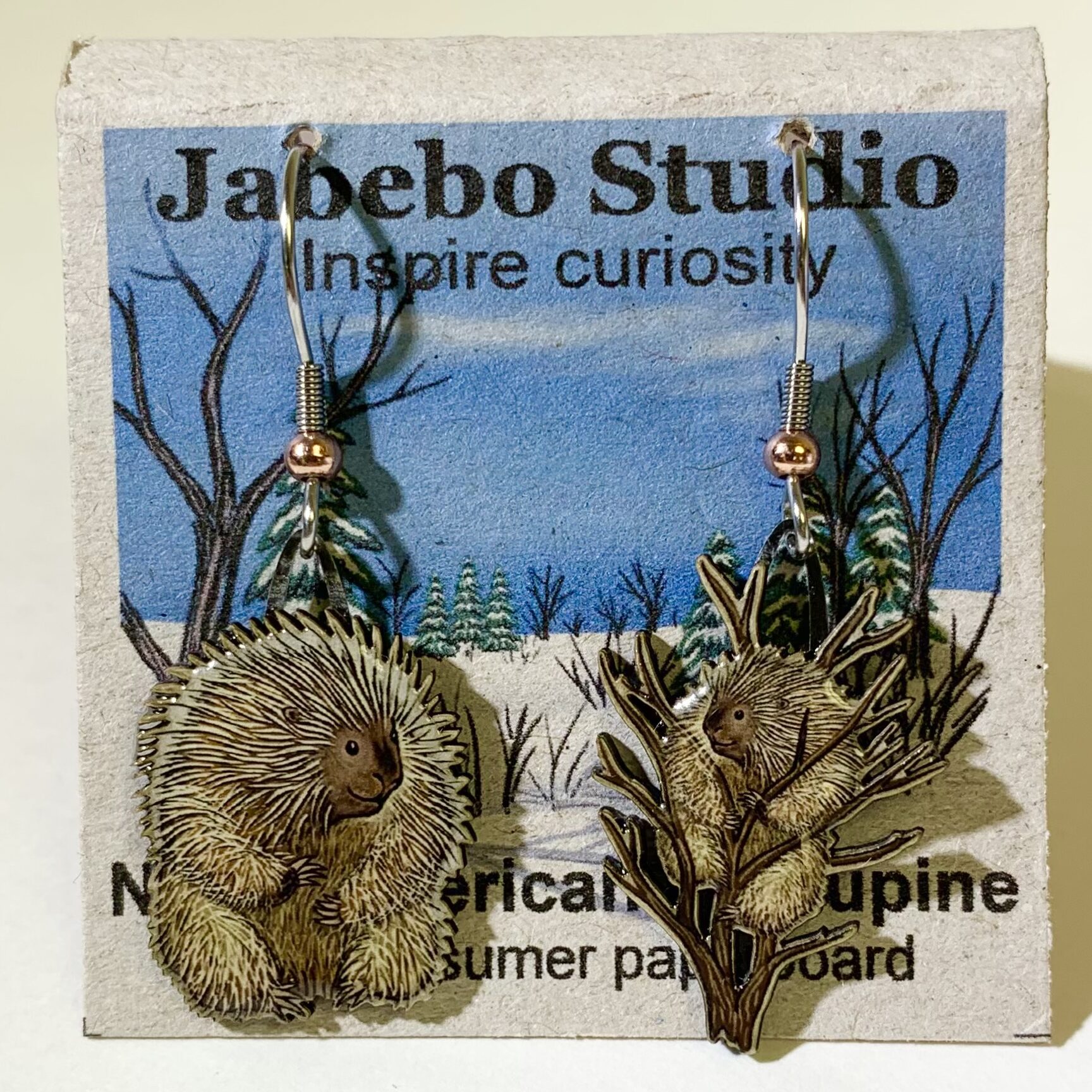 Picture shown is of 1 inch tall pair of earrings of the animal the North American Porcupine.