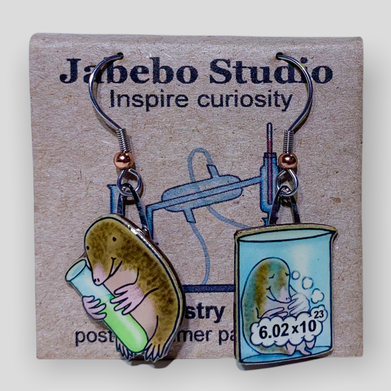 Picture shown is of 1 inch tall pair of earrings of Chemistry Mole.