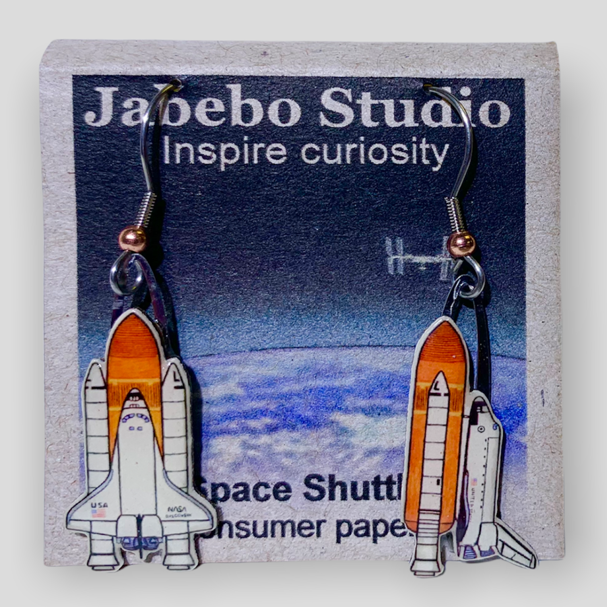 Picture shown is of 1 inch tall pair of earrings of the Space Shuttle.