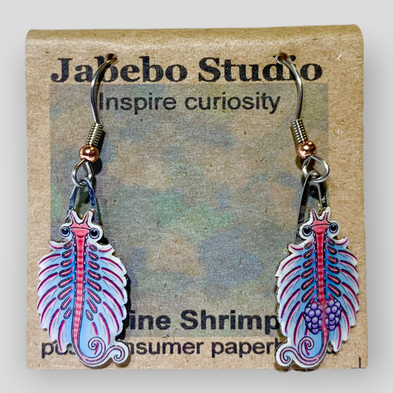 Picture shown is of 1 inch tall pair of earrings of the marine animal the Brine Shrimp.