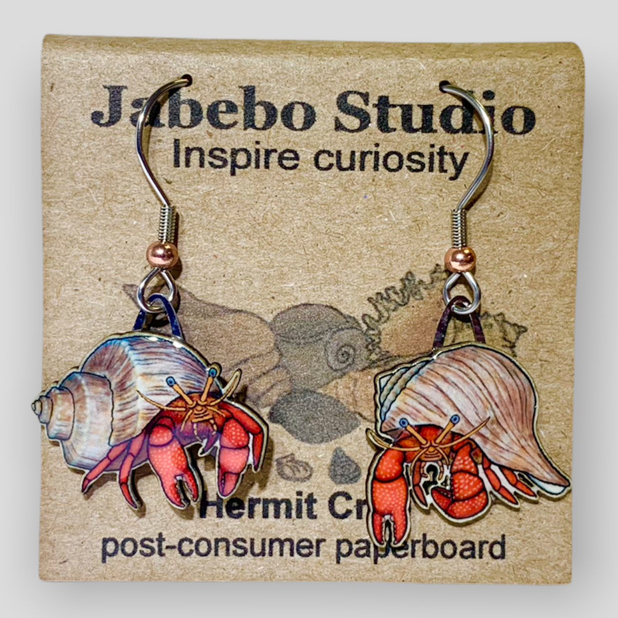 Picture shown is of 1 inch tall pair of earrings of the marine animal the Hermit Crab.