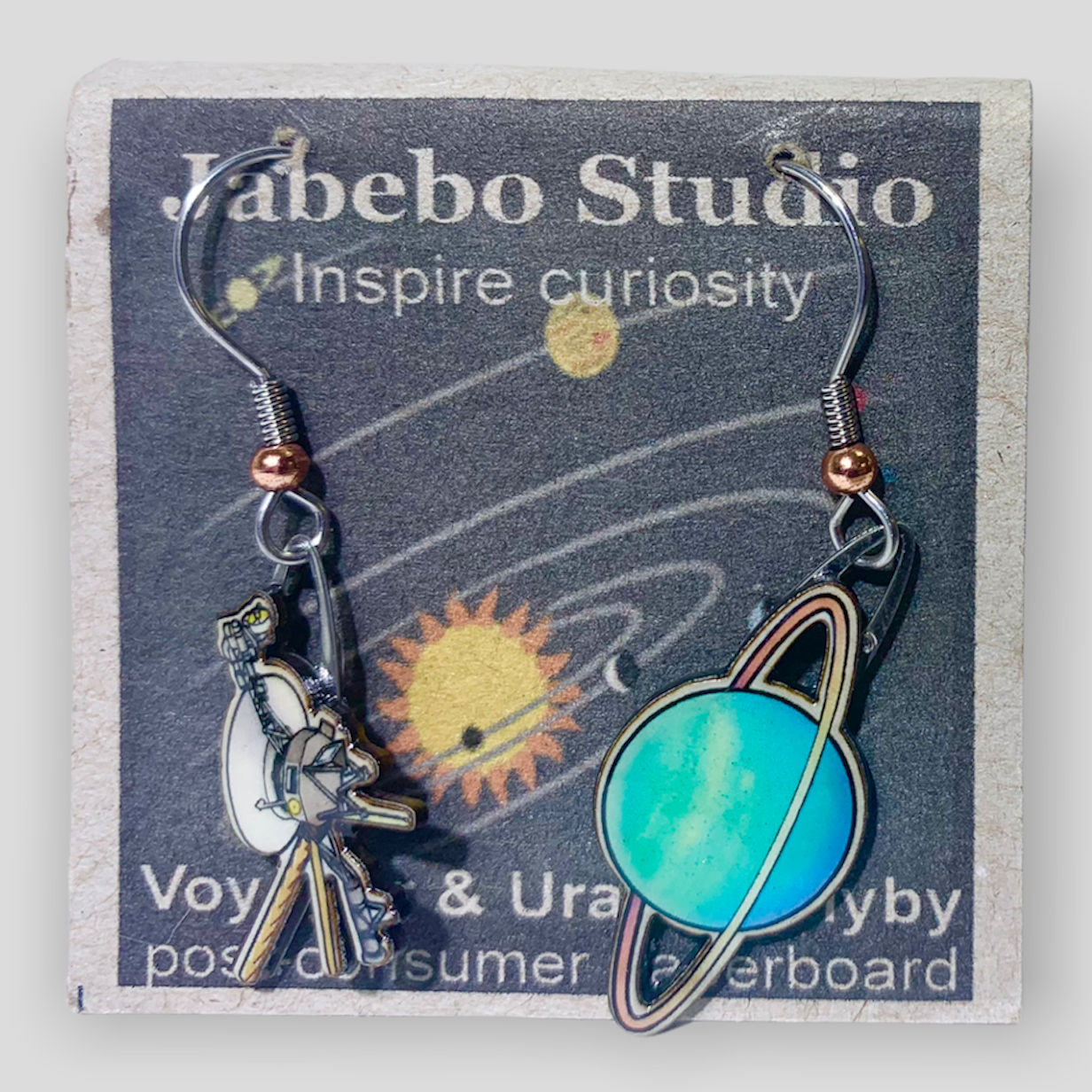 Picture shown is of 1 inch tall pair of earrings of Voyager Uranus Flyby.