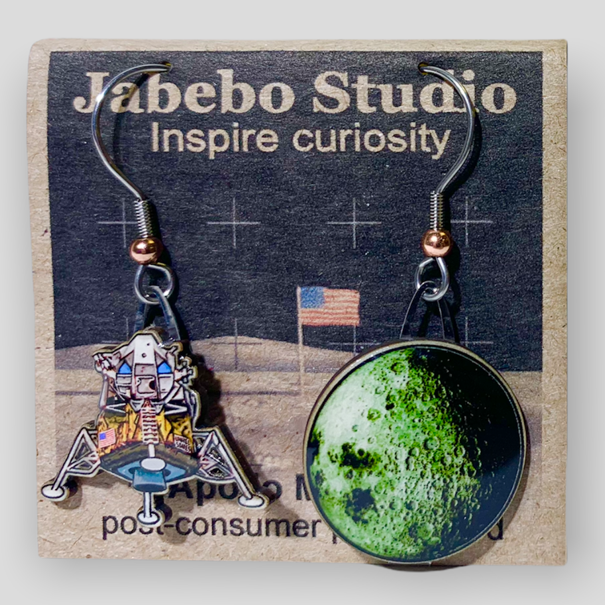 Picture shown is of 1 inch tall pair of earrings of the Apollo Mission.