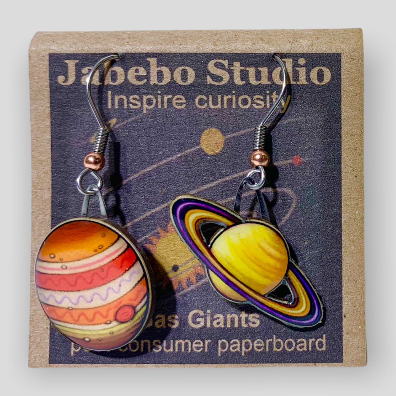Picture shown is of 1 inch tall pair of earrings of Gas Giants.