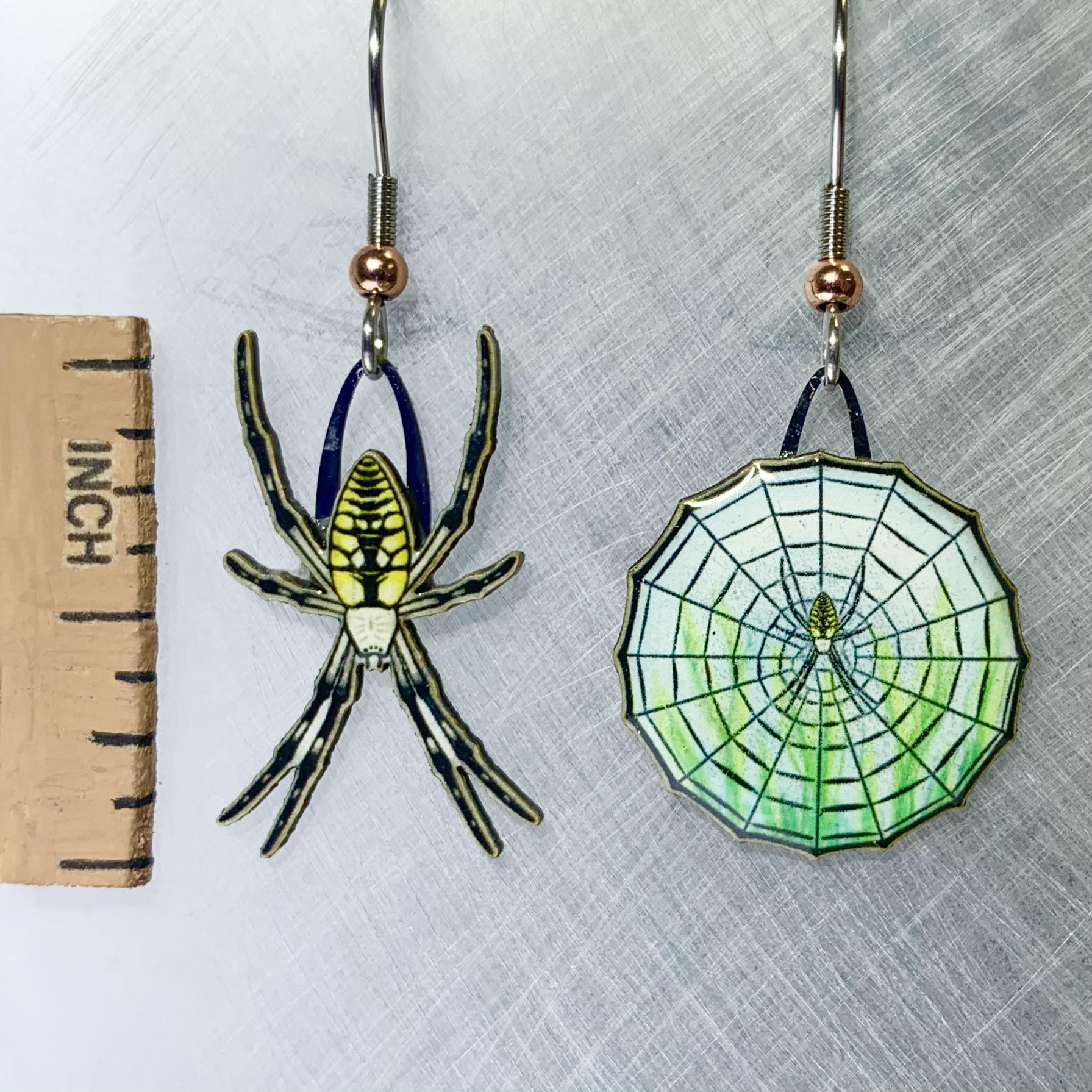Picture shown is of 1 inch tall pair of earrings of the arachnid the Garden Spider.