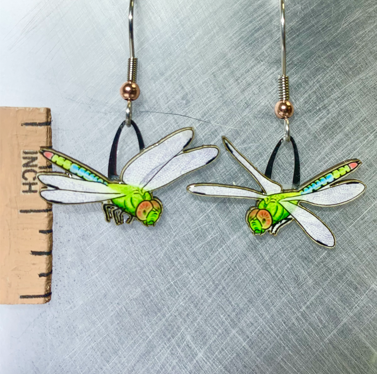 Picture shown is of 1 inch tall pair of earrings of the bug the Dragonfly.