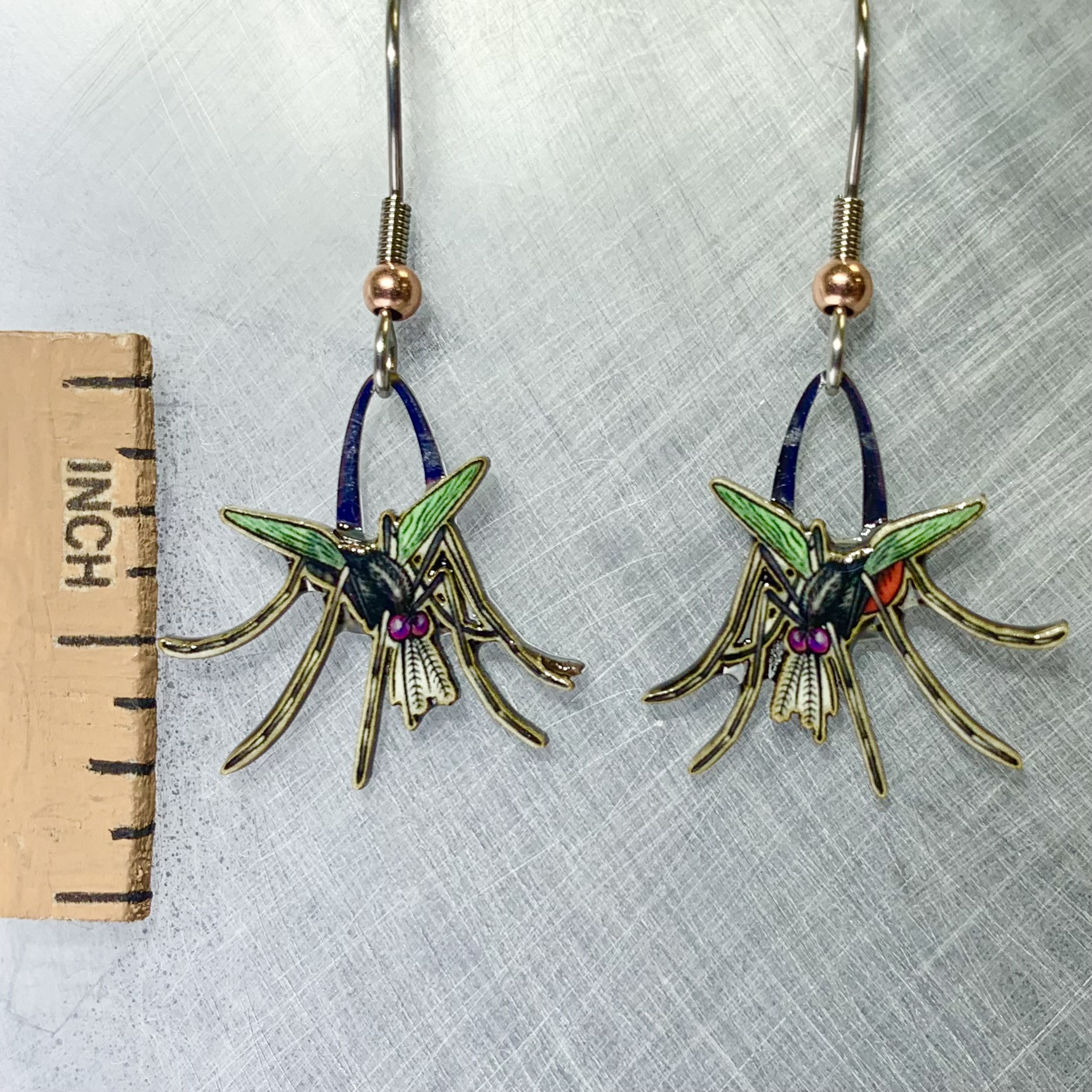 Picture shown is of 1 inch tall pair of earrings of the bug the Mosquito.