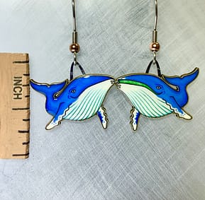 Picture shown is of 1 inch tall pair of earrings of the marine animal the Humpback Whale.