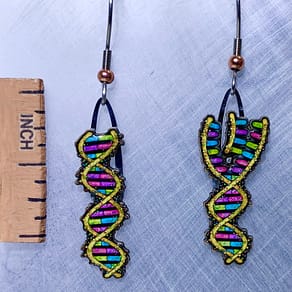 Picture shown is of 1 inch tall pair of earrings of DNA.