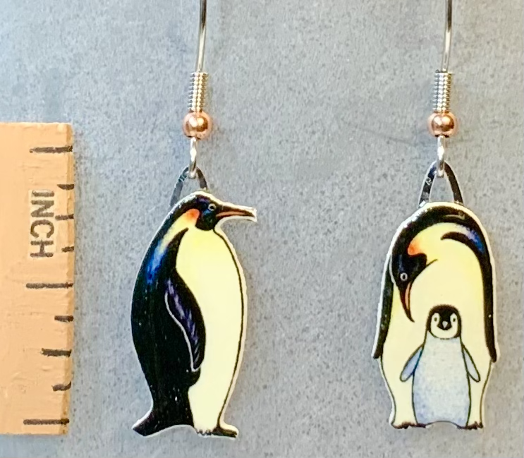 Picture shown is of 1 inch tall pair of earrings of the animal the Emperor Penguin.