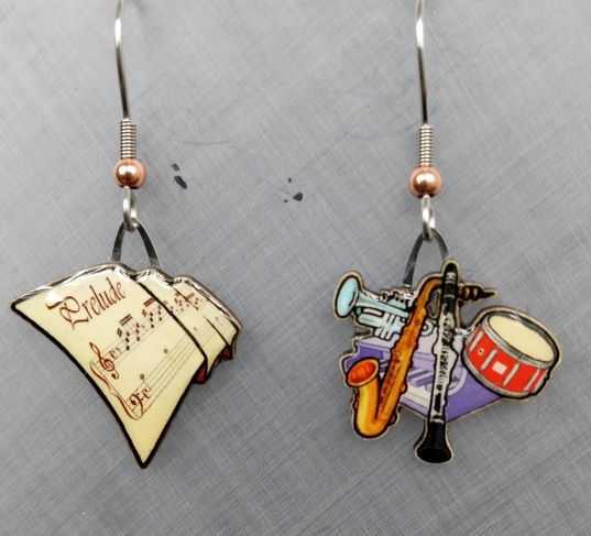 Picture shown is of 1 inch tall pair of earrings of Music.