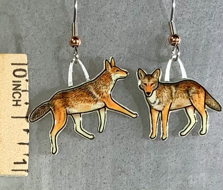 Picture shown is of 1 inch tall pair of earrings of the animal the Red Wolf.
