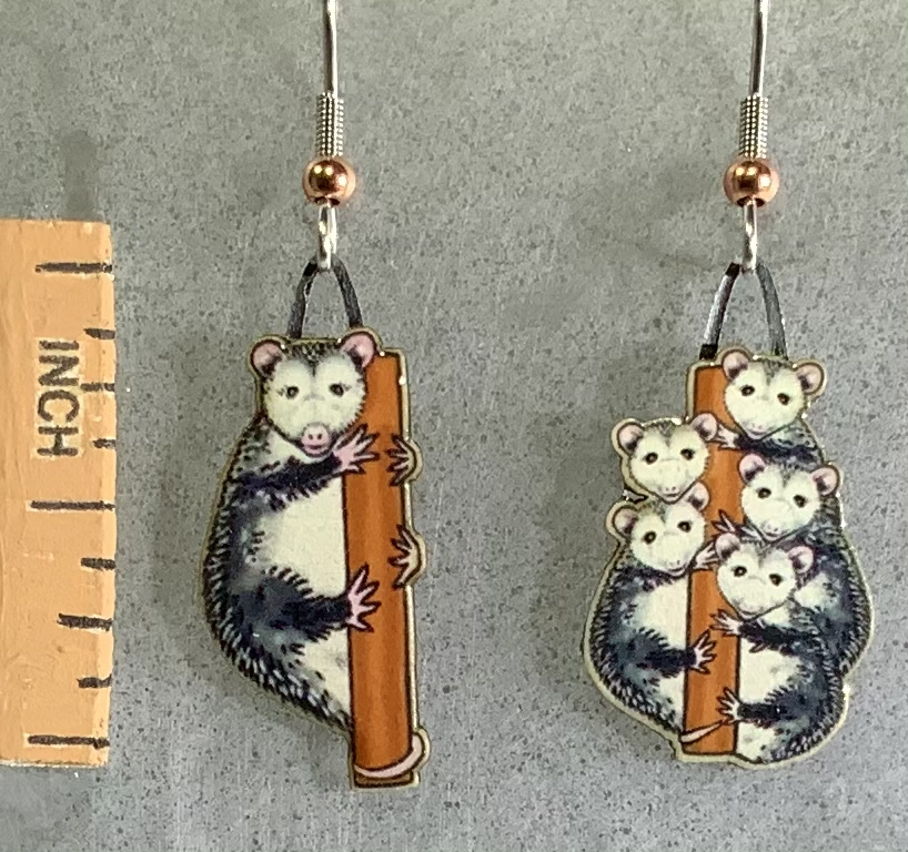 Picture shown is of 1 inch tall pair of earrings of the animal the Opossum.