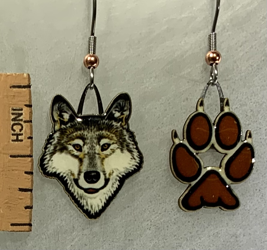 Picture shown is of 1 inch tall pair of earrings of the animal the Gray Wolf.